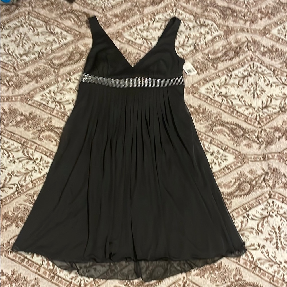 Elegant Black Dress with Silver Accents